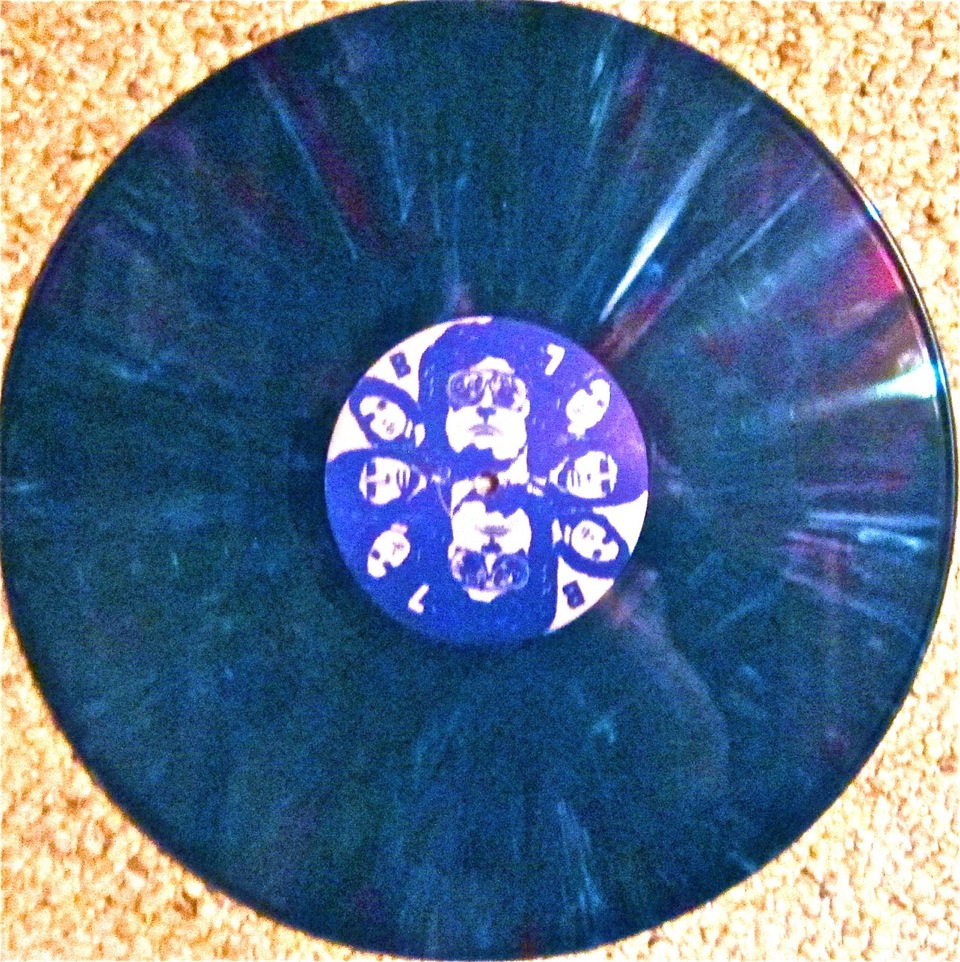 Spinning image designed by Judy Herzog and Carol Watts as the original album cover art for Blue Cheer 7, 1979